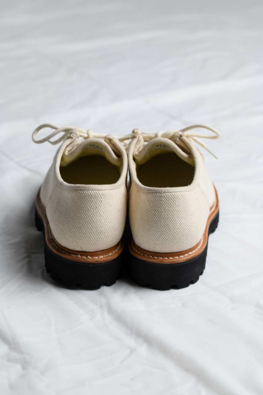 Rear view of the Benni Shoe in Oatmeal by Good News London with a white background